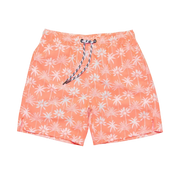 Coral swim shorts with white floral pattern on a white background
