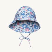 Floral patterned sun hat on a white background