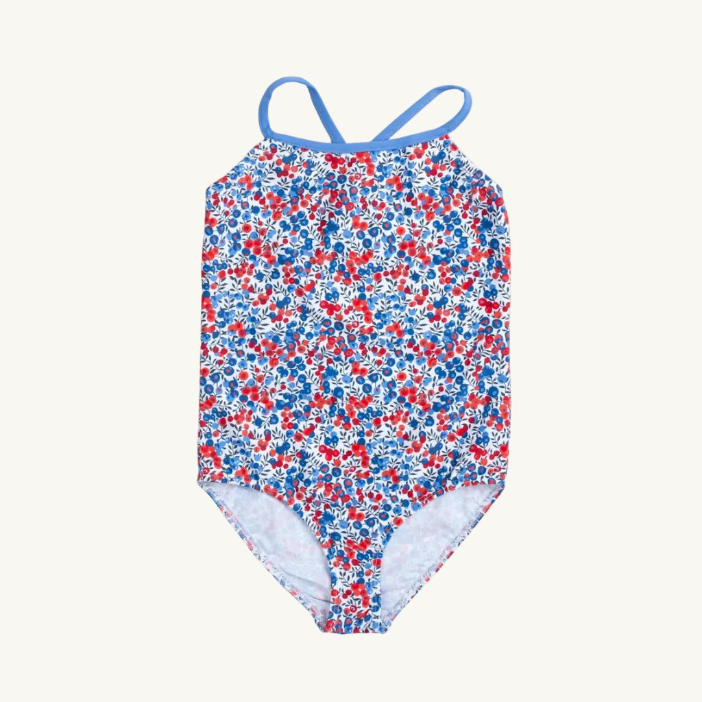 Floral-patterned swimsuit with blue straps on a white background