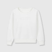 A white long-sleeved crew neck sweater.