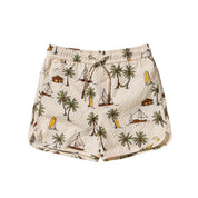 Beige shorts with tropical pattern on a white background