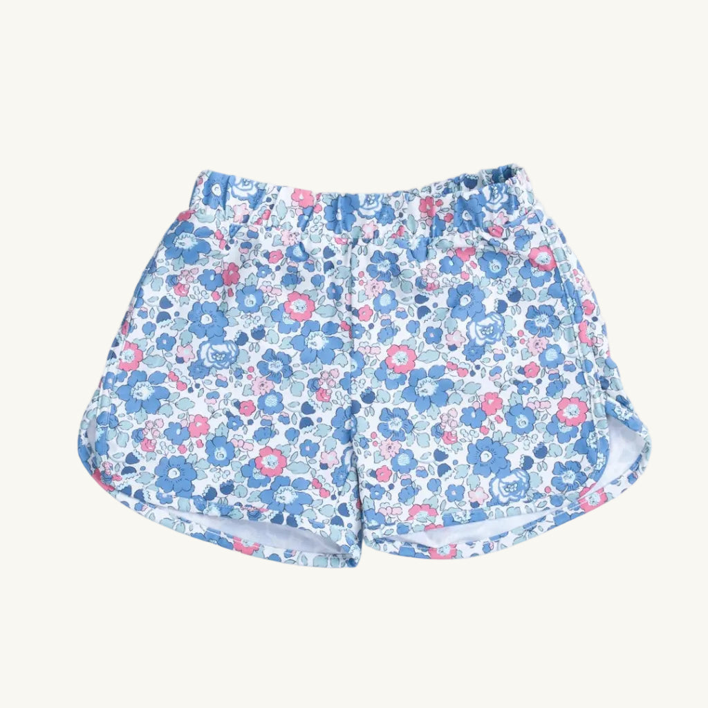 Floral patterned shorts on a white background