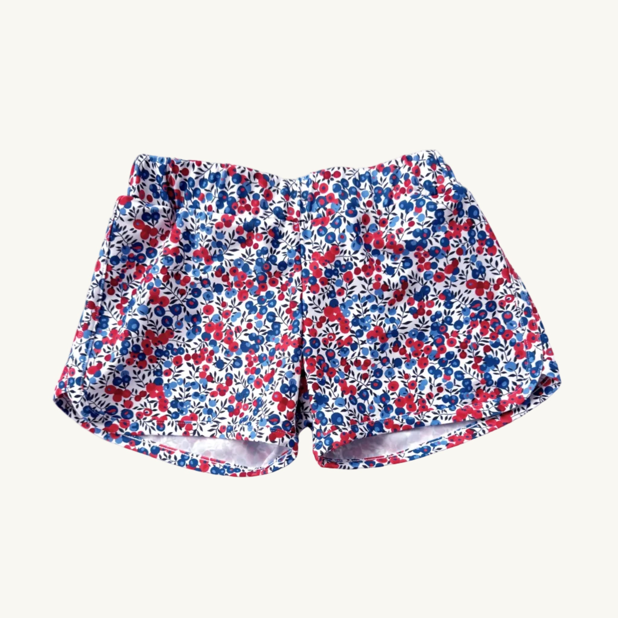 Floral patterned shorts on a white background