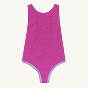 Pink swimsuit with a subtle pattern on a white background