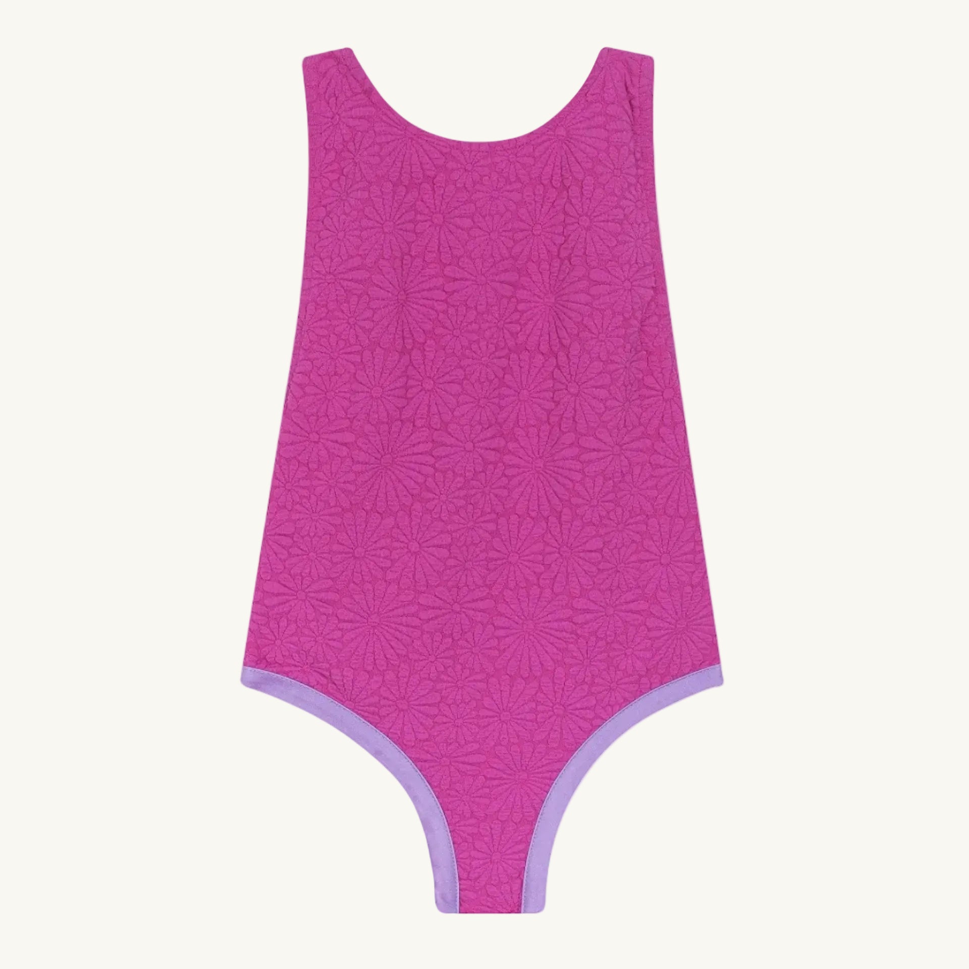 Pink swimsuit with a subtle pattern on a white background