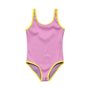 Pink swimsuit with yellow trim on a white background