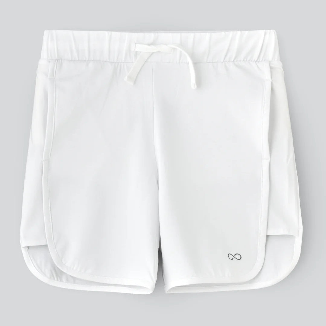 A pair of white shorts with a drawstring waist and a small logo on the left leg.