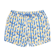 Blue and yellow patterned shorts on a light gray background
