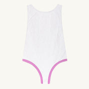 White swimsuit with pink trim on a white background